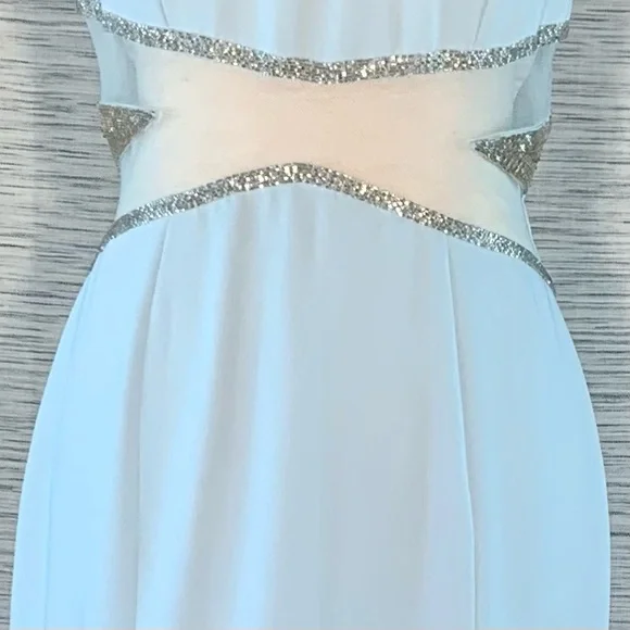 Peak Evenings Sky Blue Sleeveless Formal Evening Gown With Mesh Midriff. - Picture 4 of 15